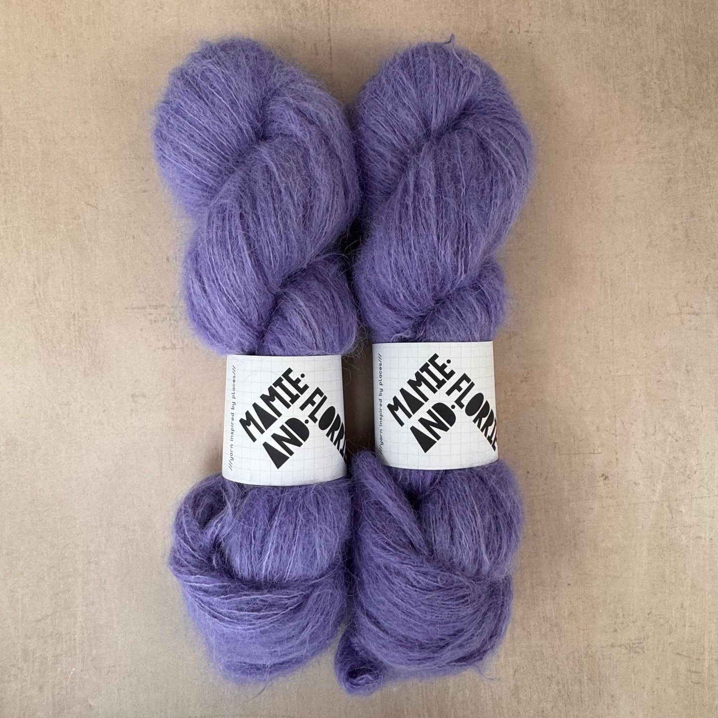 Lilac Coats on the Paris Metro - Suri Alpaca Fluff